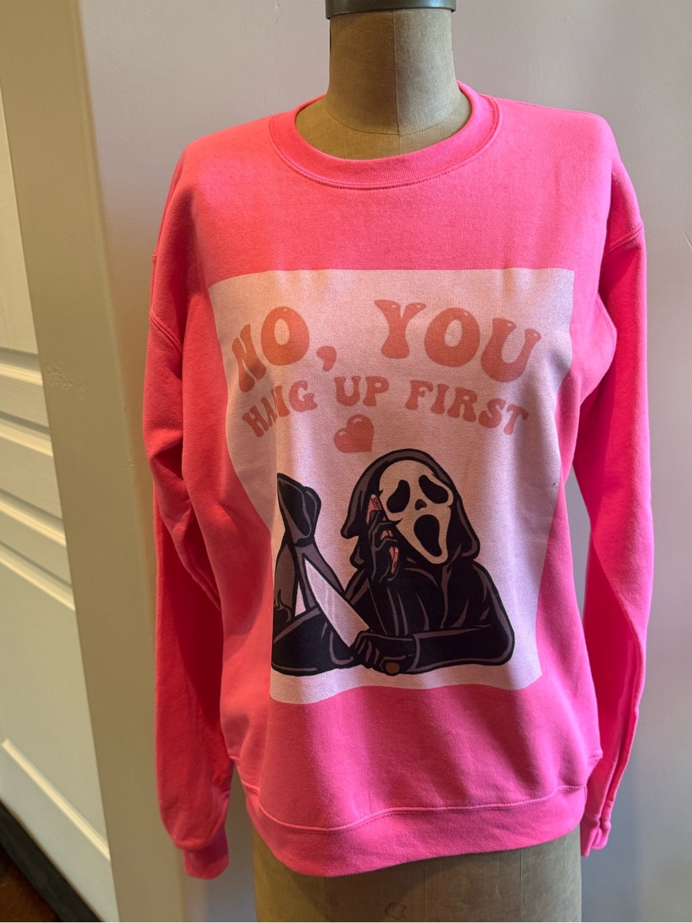 Pink Graphic Crewneck Sweatshirt — 'No, You Hug Up First' Halloween
